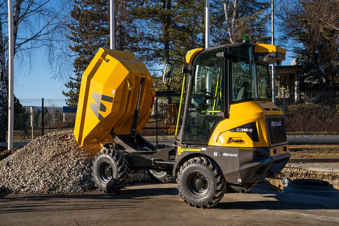 Side view of a Mecalac 3.5MDX tipping it's skip