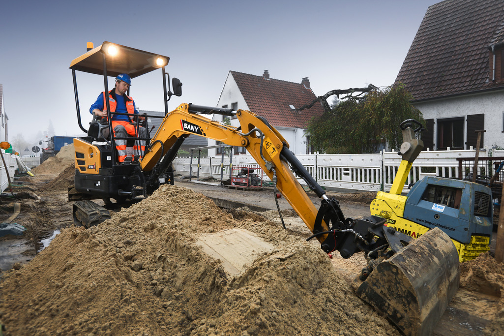 SANY SY16C mini excavator operating on a construction site